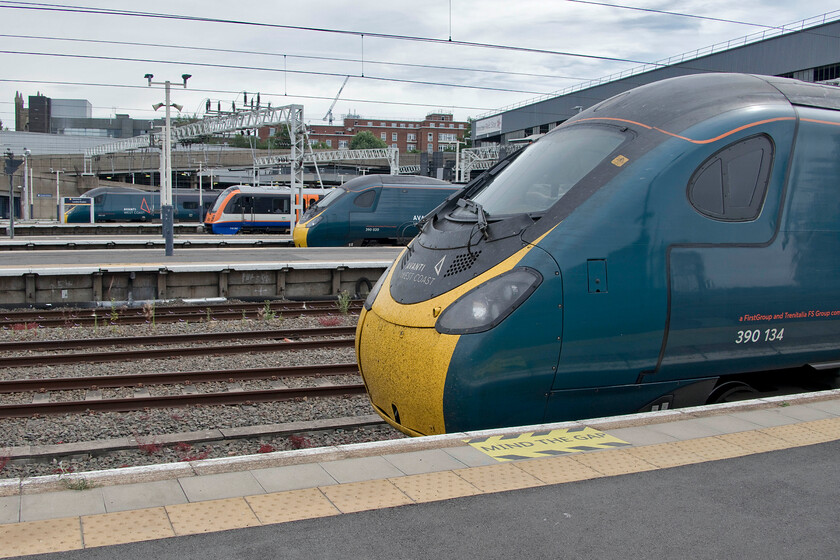 390129, VT 11.30 London Euston-Glasgow Central (1S58, RT), 710265, LO 10.15 Watford Junction-London Euston, 390020, VT 12.07 London Euston-Liverpool LS (1F16, RT) & 390134, VT 11.20 London Euston-Manchester P (1H21, 2E), London Euston station 
 A line up of trains at Euston station, from left to right .....

- 390129 'City of Stoke-on-Trent', Avanti's 1S58 11.30 to Glasgow Central
- 710265, London Overground's 10.15 from Watford Junction
- 390020, Avanti's 1F16 12.07 to Liverpool Lime Street
- 390134 'City of Lancaster' Avanti's 11.20 to Manchester Piccadilly (my wife and I travelled on this service as far as Milton Keynes) 
 Keywords: 390129, VT 11.30 London Euston-Glasgow Central (1S58, RT), 710265, LO 10.15 Watford Junction-London Euston, 390020, VT 12.07 London Euston-Liverpool LS (1F16, RT) & 390134, VT 11.20 London Euston-Manchester P (1H21, 2E), London Euston station City of Lancaster City of Stoke-on-Trent