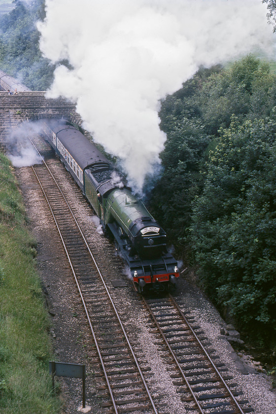 4472, outward leg of The North Yorkshireman, Carnforth-Skipton, Melling SD603711 
 An unusual angle from the top of the portal of the 57 chains (1254 yards) long Melling tunnel 4472 'Flying Scotsman' is seen working hard leading the outward leg of The North Yorkshireman railtour. A short distance beyond the tunnel is Wennington, where the train paused, giving us enough time to pile back in the Mini and race there to secure some more shots of it leaving. 
 Keywords: 4472 outward leg of The North Yorkshireman Carnforth-Skipton Melling SD603711