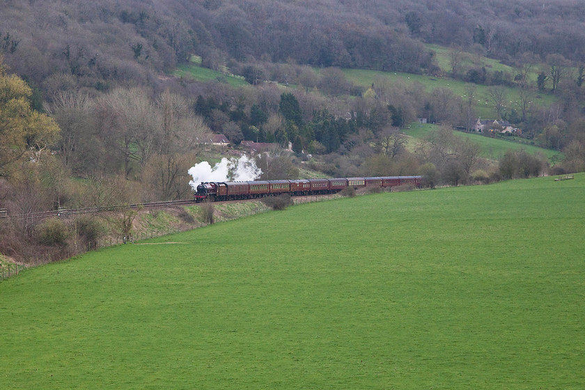 45699, outward leg of The Cathedrals Express, West Brompton-Gloucester (1Z53), Avon Valley ST782652 
 Yes, the sun was in off course! 45699 ' Galatea' drifts through the beautiful Avon Valley between Bradford-on-Avon and Bath Spa hauling The Cathedrals Express from West Brompton to Gloucester running as 1Z53. The hamlet of Warleigh can be seen in the background. 
 Keywords: 45699 The Cathedrals Express 1Z53 Avon Valley ST782652