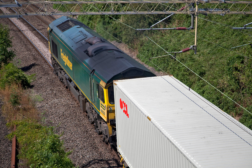 666529, 09.25 Southampton MCT-Garston FLT (4M28), Victoria Bridge 
 A grab shot of 66529 as it passes under Victoria Bridge leading the diverted 09.25 Southampton to Garston 4M28 Freightliner. I had literally pulled up in my van on the bridge as the train approached giving me about five seconds to get the camera out, luckily the settings were good enough to capture the train! 
 Keywords: 66529 09.25 Southampton MCT-Garston FLT 4M28 Victoria Bridge