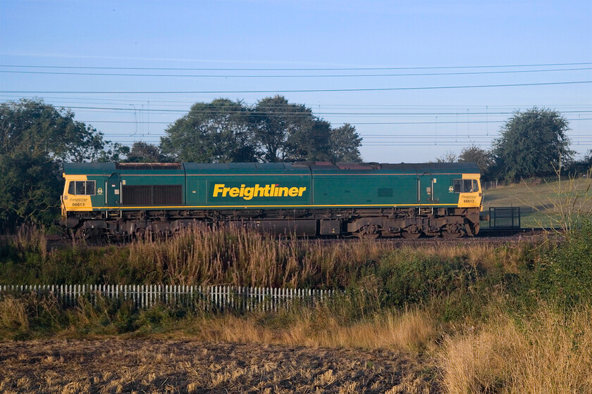 66613, 03.15 Felixstowe North-Trafford Park (06.09 Willesden Yard-Crewe Basford Hall (0M69, 4E), between Roade & Ashton 
 Something is amiss here: this should be running as the regular 4M16 03.15 Felixstowe to Trafford Park Freightliner service. However, as can be seen, it is running as a light engine with the 0M69 reporting number. It left Willesden Yard using 4M16's path rather than from Felixstowe ending up being terminated short of Trafford Park at Crewe Basford Hall. The locomotive is seen heading north between the Northamptonshire villages of Roade and Ashton. Any further information is appreciated. 
 Keywords: 66613 03.15 Felixstowe North-Trafford Park 06.09 Willesden Yard-Crewe Basford Hall 0M69 between Roade & Ashton