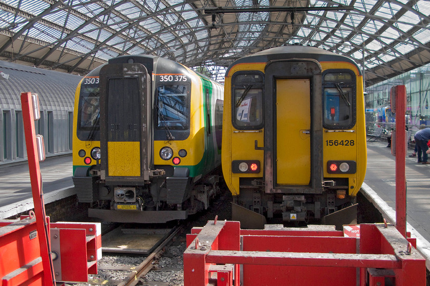 350375, LM 13.34 Liverpool Lime Street-Birmingham New Street (1L99) & 156428, NT 13.27 Liverpool Lime Street-Manchester Oxford Road (2H40), Liverpool Lime Street station 
 Our journey home from Liverpool to Northampton was completed in three stages. The first part of the journey was on 350375 from here at Lime Street to Stafford on the 13.34 to Birmingham New Street. The train waits at platform eight whilst 156428 will work the 13.27 to Manchester Oxford Road. 
 Keywords: 350375 13.34 Liverpool Lime Street-Birmingham New Street 1L99 156428 13.27 Liverpool Lime Street-Manchester Oxford Road 2H40 Liverpool Lime Street station London Mildand Desiro Northern Trains Sprinter