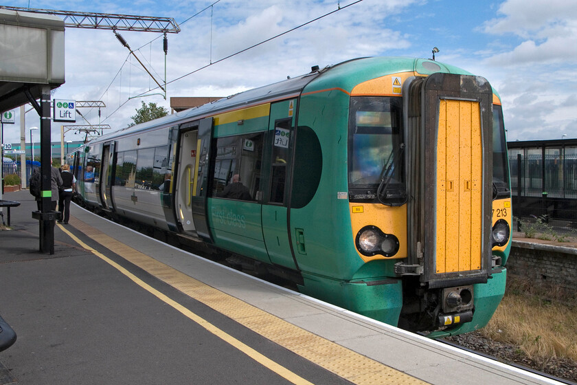 377213, SN 10.17 Watford Junction-Clapham Junction, Watford Junction station 
 377213 stands at Watford Junction's platform ten waiting to work Southern's 10.17 service to Clapham Junction. My wife, son and I travelled on this train as far as Kensington Olympia station getting into the heart of West London ready for our day. 
 Keywords: 377213 10.17 Watford Junction-Clapham Junction Watford Junction station Southern Electrostar