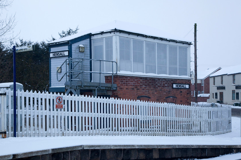 Hensall signal box (L&Y, 1875) 
 My second visit to Hensall station and another chance to photograph the closed signal box. This Lancashire and Yorkshire signal box is Grade II listed according to Historic England. It describes it as being in 'Swiss Cottage style' and relatively unaltered. At least this designation will ensure its survival for the foreseeable future. 
 Keywords: Hensall signal box L&Y