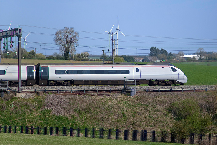 390117, VT 11.32 Liverpool Lime Street-London Euston (1A32, 3E), Roade Hill 
 As it was so bright I decided to try a fast shutter speed rather than the more common pan method to capture 390117 passing Roade Hill in south Northamptonshire. However, even at 1/3200sec close up examination of the train reveals a little motion blur and it was not going particularly fast having just come off the Weedon loop. However, it would be ramping up now for the much straighter run towards Milton Keynes! The Pendolino was working the 11.32 Liverpool Lime Street to Euston that arrived at its destination, like most services at the moment, early! 
 Keywords: 390117 11.32 Liverpool Lime Street-London Euston 1A32 Roade Hill Avanti west coast Pendolino