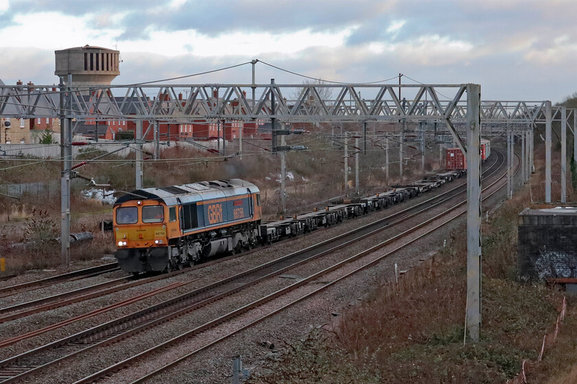 66756, 10.26 Felixstowe South-Trafford Park (4M22, 6L), site of Roade station 
 66756 'Royal Corps Of Signals' passes Roade in the late afternoon light leading GBRf's 10.26 Felixstowe South to Trafford Park service. This Class 66 was named back in the summer of 2017 at Swanage as part of the Armed Forces Day celebrations. 
 Keywords: 66756 10.26 Felixstowe South-Trafford Park 4M22 site of Roade station Royal Corps Of Signals GBRf