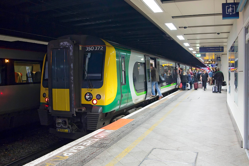 350372 & 350373, LM 16.14 Birmingham New Street-London Euston (2Y46, RT), Birmingham New Street station 
 My wife and son are seen boarding 350372 with 350373 attached to the rear. We are making our way home from Birmingham on this train working the 16.14 to London Euston as far as Northampton. 
 Keywords: 350372 350373 2Y46 Birmingham New Street station