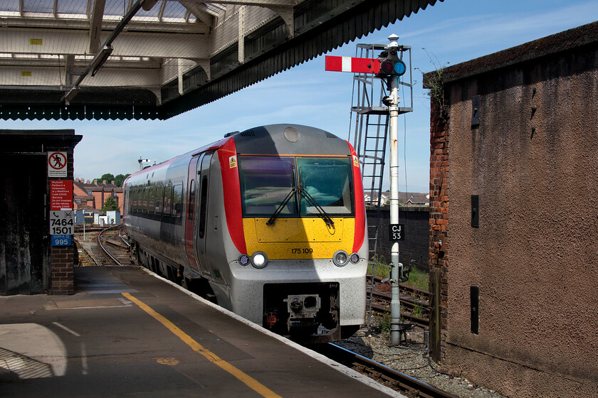 175109, AW 11.31 Manchester Piccadilly-Carmarthen (cancelled from Swansea) (1V40, 15L), Shrewsbury station 
 Shrewsbury remains a mecca for fans of mechanical signalling nearly a quarter of the way through the twentieth century! 175109 arrives at the station on a beautiful early summer's day working the 1V40 11.31 Manchester Piccadilly to Carmarthen train. Unfortunately, things went wrong later for the Transport for Wales Service working with a late arrival at Swansea precipitating its cancellation. Presumably, any onward bound passengers transferred to a slightly later 'local' service? Standing proud in the sunshine, starter signal CJ53 allows for reverse departures from the otherwise designated up platform towards Crewe when required. 
 Keywords: 175109 11.31 Manchester Piccadilly-Carmarthen cancelled from Swansea 1V40 Shrewsbury station