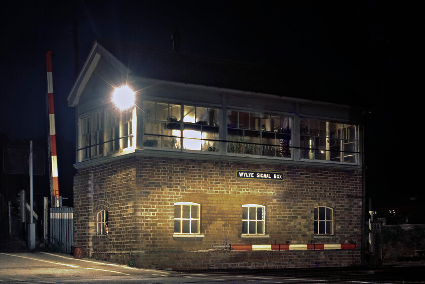 Wylye signal box (GW, date unknown) 
 Utilising the headlights of UVJ 129J (The Austin 1100) to illuminate the front Wylye signal box is seen. The box was of a similar design to Codford a short distance northwest from here being a GWR design dating from sometime between 1889 and 1896. The station at Wylye closed in September 1955 with the box seen here managing another seven months being closed with the expansion of the Salisbury panel on 29.03.82. Unfortunately, I never revisited this delightfully rural location despite it also being relatively close to my home. Also, I regret that Graham and I missed the intermediate box between here and Codford during our evening survey of the line, the closed Sherington Crossing box. I am pretty sure that despite it being closed that the Type 13 wartime ARP box was still standing in 1981. 
 Keywords: Wylye signal box GWR GReat Western Railway