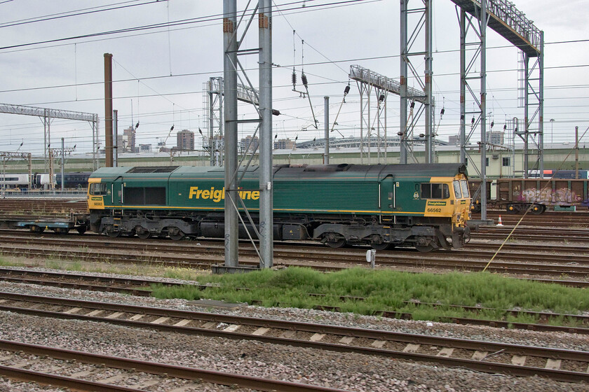 66562, 05.34 DIRFT-Tilbury (4Z61), Wembley Yard 
 With its three-hour layover at Wembley overrunning considerably the 05.34 Daventry to Tilbury Freightliner service is seen with 66562 at the head. This regular weekday flow has the curious reporting number of 4Z61. Whilst the 4 is correct (fast freight) Z usually refers to an STP (short term planned) service being more usually associated with charters. As this flow is now regular I wonder if it will revert to a more normal route identifier letter? 
 Keywords: 66562 05.34 DIRFT-Tilbury 4Z61 Wembley Yard Freightliner