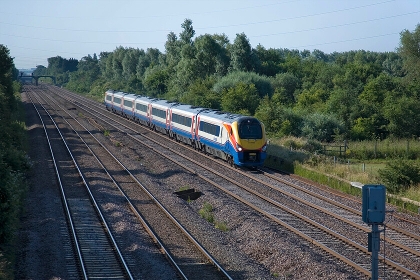 222005, EM 07.30 London St. Pancras-Nottingham (1D09), Lower Farm Road, Bromham TL028518 
 The 07.30 St. Pancras to Nottingham service passes near the Bedfordshire village of Bromham worked by 222005. Whilst a sunny day is a blessing when it's in July it can create problems with extreme contrast and deep shadows a little of which can be seen here. 
 Keywords: 222005 07.30 London St. Pancras-Nottingham (1D09), Lower Farm Road, Bromham TL028518 EMT East Midlands Trains meridian