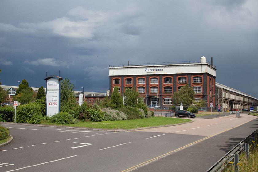 Exterior, Swindon Outlet Village 
 Another familiar building that remains standing is the grade II listed patterns store and water tower. It was built in 1897 and closed, along with the rest of the works, in 1986. 
 Keywords: Swindon Outlet Village