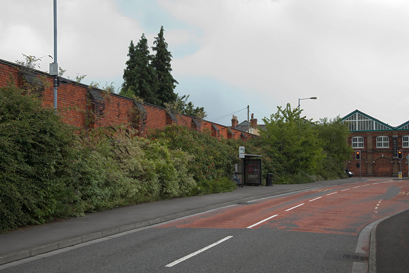 Former boundary wall, Swindon Works 
 The former boundary wall at the back of the works. It is a familiar design with its tall capped support buttresses and featured in many pictures taken during work's visits. 
 Keywords: Former boundary wall Swindon Works