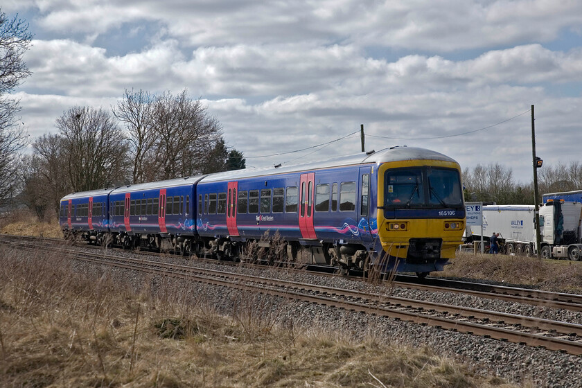 165106, GW 10.16 Oxford-Banbury, King's Sutton SP486377 
 Having just stopped at King's Sutton FGW's 165106 picks up speed working the 10.16 Oxford to Banbury all-stations service. This shuttle service is a strange anomaly being well away from the expected operating area for what is after all a TOC that operates trains west from London. Of course, historically, this location is deeply in GWR territory since the privatisation 'carve up' things have changed. Also, this is the only point that FGW operates any services, albeit for a very short distance, in Northamptonshire. 
 Keywords: 165106 10.16 Oxford-Banbury King's Sutton SP486377 First Great Western