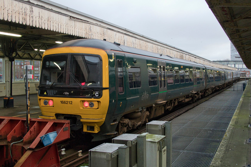 166212, GW 05.51 Bristol Temple Meads-Portsmouth Harbour (1F03, RT), Portsmouth Harbour station 
 Standing at Portsmouth Harbour station Great Western Railway's 166212 is seen having just terminated with the 05.51 from Bristol. Always associated with the Thames Valley lines in and out of Paddington for so many years it's strange seeing the Turbo units in places such as Portsmouth. 
 Keywords: 166212 05.51 Bristol Temple Meads-Portsmouth Harbour 1F03 Portsmouth Harbour station Great Western Railway Turbostar