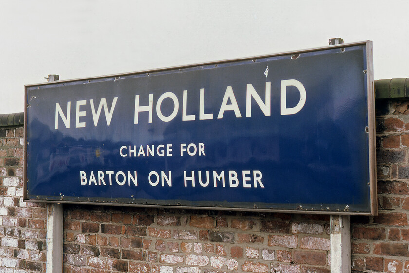 Enamel, New Holland Town station 
 A large British Railways (Eastern) blue enamel is seen on the station of the same name. The station was to close exactly seven days later on from when this photgraph was taken with the opening of the Humber bridge that replaced the Humber Ferry. I wonder where this grand sign was to end up; locally in somebody's collection I hope! 
 Keywords: Enamel New Holland Town station BR blue