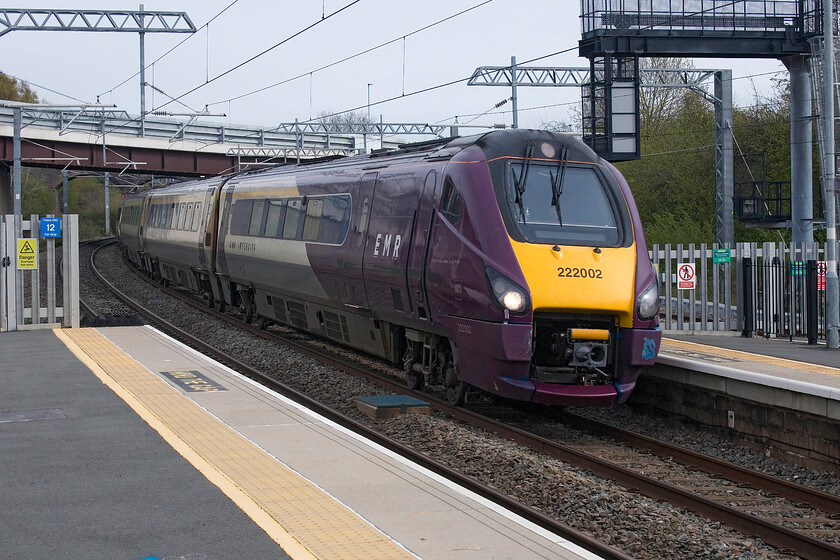 222002, EM 07.52 Sheffield-London St. Pancras (1C23, RT), Wellingborough station 
 Having seen 222001 a few minutes earlier working north subsequently numbered 222002 passes Wellingborough working the 1C23 07.52 Sheffield to St. Pancras fast service. I first visited Wellingborough station back in 1980 and will have stood in a very similar spot to take this photograph, see. https://www.ontheupfast.com/p/21936chg/29653197204/x45112-up-working-wellingborough 
 Keywords: 222002 07.52 Sheffield-London St. Pancras 1C23 Wellingborough station EMR EMT East Midlands Meridian