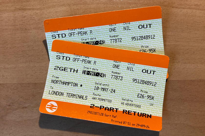 Tickets, Northampton-London Euston 
 Our outward off-peak return tickets are seen. Whilst picking specific trains to travel on may be a little cheaper, my wife prefers the flexibility of being able to travel on any off-peak services. 
 Keywords: Tickets, Northampton-London Euston