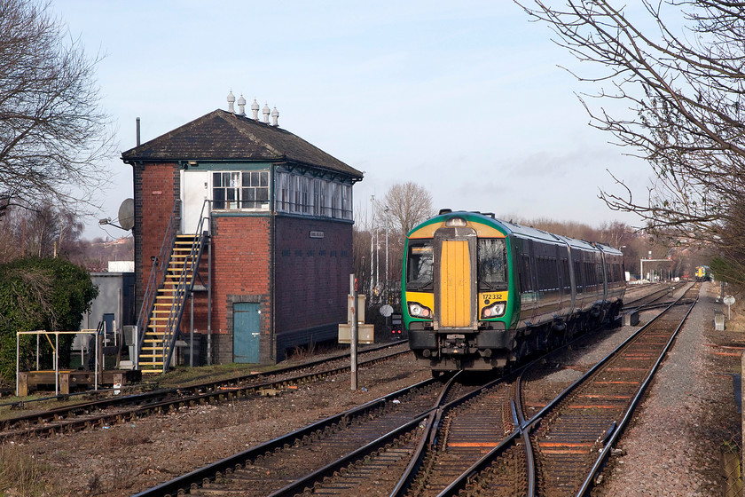 172332, LN 12.25 Kidderminster-Whitlocks End (2S40, RT), Stourbridge Junction station 
 172332 leaves Stourbridge Junction station with the 2S40 12.25 Kidderminster to Whitlocks End working. The former GWR Stourbridge Junction signal box (GW, 1901) still stands despite the area being resignalled in 2012. It appeared, judging by the staff comings and goings, that it was being used as a drivers' mess room or even a signing-on point....help anybody? 
 Keywords: 172332, 2S40 Stourbridge Junction signal box