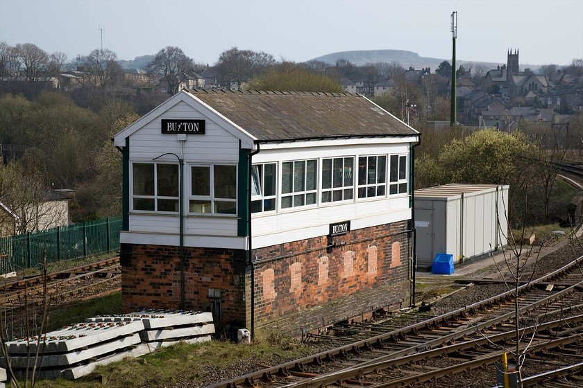 Buxton signal box (LNWR, 1894) 
 The lovely Buxton signal box is seen in some pleasant afternoon sunshine. The box, formally named Buxton No. 1, is an LNWR Type 4 box dating from 1894 that received the UPVC treatment in 2004 that does spoil its looks somewhat. Today it still controls a number of signals radiating on four routes away from the box with absolute block in operation as far as Chapel-en-le-Frith. The remaining three routes are into the station, the Briggs branch up to the Hindlow and Dowlow quarries, and the route to Great Rocks Junction. 
 Keywords: Buxton signal box