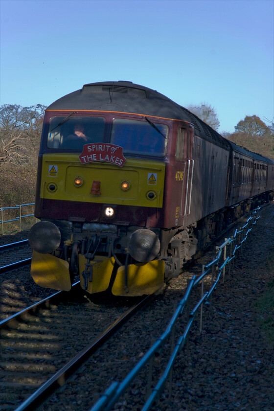 47245, outward leg of The Christmas Special-The City of Bath, Skegness-Bath Spa (1Z36), Middlehill footbridge ST805680 
 Unfortunately, I have not quite positioned the train correctly in this photograph with the front of WCR's 47245 largely in the shade. The locomotive is leading the outward leg of the rather clumsily named 'The Christmas Special-The City of Bath' charter that started out from Skegness and was running as 1Z36. Passengers would be able to enjoy a few hours wandering around Bath's huge and popular Christmas market. 
 Keywords: 47245 The Christmas Special-The City of Bath, Skegness-Bath Spa 1Z36 Middlehill footbridge ST805680 WCR West Coast Railway