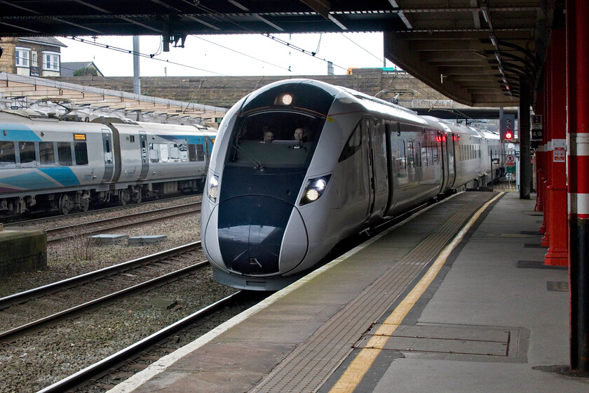 805004, 08.03 London Euston-Lancaster (5Q11, RT), Lancaster station 
 On yet another test run/driver training/mileage accumulation run (whatever it may have been) 805004 drifts slowly into Lancaster station as the terminating 08.03 ex London Euston. After a brief wait at the platform with some staff ticking boxes on sheets attached to clipboards and the taking of various photographs the crew changed ends and it disappeared off south again. Soon (?) these new units will enter service with Avanti displacing the dreaded Class 221 Voyagers. 
 Keywords: 805004 08.03 London Euston-Lancaster 5Q11 Lancaster station