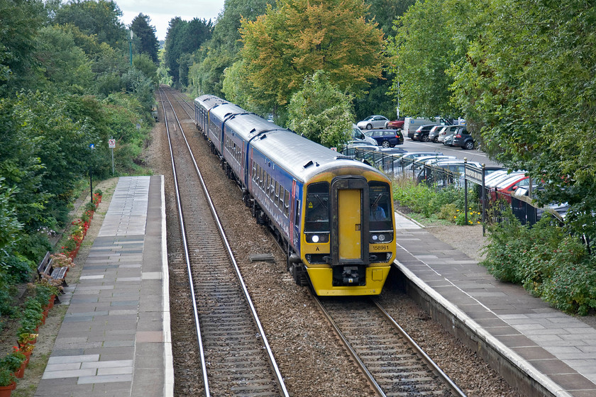 158961 & 150121, GW 14.30 Cardiff Central-Portsmouth Harbour (1F23), Bradford-on-Avon station 
 Taken from the station footbridge, 158961 and 150121 arrive at the station with the 14.30 Cardiff to Portsmouth Harbour train. Just compare this train and the changes since a very similar photograph was taken in 1979. Then, it was a locomotive-hauled train of some eleven coaches with the station car park in full view rather than being mostly obscured by tree growth, see...... https://www.ontheupfast.com/p/21936chg/27007736804/x47337-15-14-bristol-temple-meads 
 Keywords: 158961 150121 GW 14.30 Cardiff Central-Portsmouth Harbour 1F23 Bradford-on-Avon station First Great Western