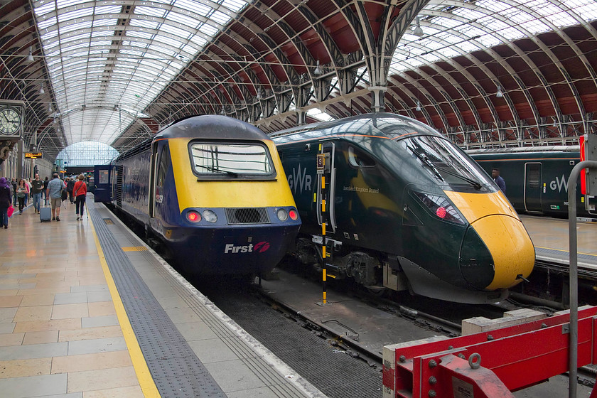 43029, GW 15.03 London Paddington-Plymouth (1C86, 8L) & 800004, GW 15.00 London Paddington-Bristol Temple Meads (1C19, 1E), London Paddington station 
 Old and new stand on platforms one and two at London Paddington. On the fabled platform one sits the 1C86 15.03 HST working to Plymouth. At the rear is power car 43029 that was originally part of Western Region set 253014. I have very few pictures of this particular power car in my entire archive so this one, in its dotage, is a bonus! Next to the HST at platform two is 800004 'Isambard Kingdom Brunel' that is going to work the 1C19 15.00 to Bristol Temple Meads. 
 Keywords: 43029 1C86 800004 1C19 London Paddington station