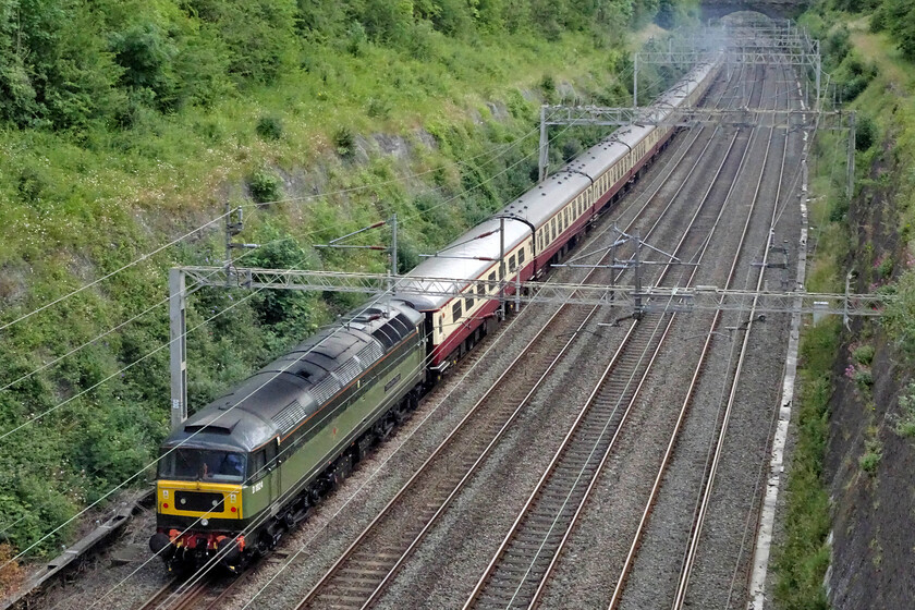 D1924, 14.17 Northampton DGL-Southall WCR (5Z63, 14L), Roade cutting 
 With 47593 'Galloway Princess' appearing to working hard at the front of the train D1924 'Crewe Diesel Depot' is going along for the ride at the rear! The train is running as 5Z63, the 14.17 Northampton DGL to Southall WCR and is seen passing through Raode cutting. The stock is being returned to the West London depot after yesterday's Saphos Trains' English Riviera Express charter that started and finished at Northampton arriving back after midnight. 
 Keywords: D1924 14.17 Northampton DGL-Southall WCR 5Z63 Roade cutting Crewe Diesel Depot