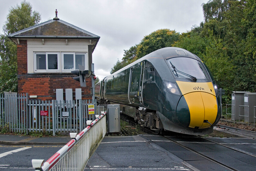 800023, GW 11.57 Great Malvern-London Paddington (1P28, 9L), Henwick level crossing 
 800023 'Kathryn Osmond and Firefighter Fleur Lombard' passes Henwick signal box, taken from the level crossing, working GWR's 11.57 Great Malvern to Paddington service. The tracks are bi-directional through Worcester Foregate Street with the 1P28 appearing to be running 'wrong-line' on the approach to the station prior to it crossing the impressive viaduct that crosses the River Severn a short distance behind me, 
 Keywords: 800023 11.57 Great Malvern-London Paddington 1P28 Henwick level crossing GWR IET Kathryn Osmond and Firefighter Fleur Lombard