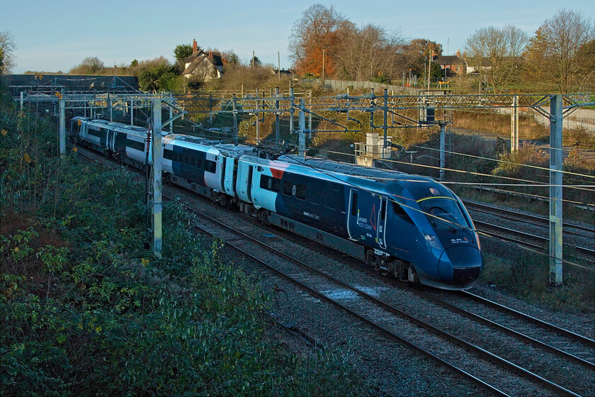 805004, 12.07 Preston-London Euston (3A92, 2L), site of Roade station 
 The testing and staff training on the Everos continues. 805004 passes Roade working the 3A92 12.07 Prston to London Euston. In theory, all the Everos should be in service within two weeks at the start of the winter timetable. However, as with all of these things, slippage could mean that the Voyagers (being replaced) could be around into 2025. 
 Keywords: 805004 12.07 Preston-London Euston 3A92 site of Roade station AWC Avant West Coast Evero