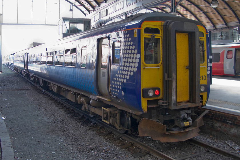 156510, SR 13.23 Newcastle-Glasgow Central (1S74), Newcastle station 
 ScotRail's 156510 is about to commence its one hundred and seventy-six-mile journey to Glasgow Central as the 13.23 from Newcastle. This superb journey goes via the lovely Tyne Valley through Hexham to Carlisle. Then it heads north into Scotland taking the dramatic former G&SWR route through Dumfries and Kilmarnock that passes through some dramatic and remote countryside. 
 Keywords: 156510 13.23 Newcastle-Glasgow Central 1S74 Newcastle station ScotRail