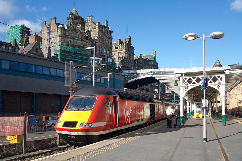 43300, GR 09.30 Edinburgh Waverley-London Kings-Cross (1E09), Edinburgh Waverley station 
 Under a glorious sky with Edinburgh's Old Town dominating the background, 43300 'Craigentinny' is seen at the head of the 09.30 to King's Cross. With ten minutes to go before departure the train crew chat on the platform catching some late summer sun. 
 Keywords: 43300 09.30 Edinburgh Waverley-London Kings-Cross 1E09 Edinburgh Waverley station