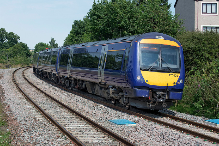 170420, SR 15.05 Arbroath-Edinburgh Waverley (1L58, 3L), Cupar station 
 170420 arrives at Cupar station working the 15.05 Arbroath to Edinburgh Waverley. These smart ScotRail class 170s have pretty much a stranglehold on these services but I suspect that travelers have applauded the introduction of the short set HSTs with their comfy seats, quiet environment, and picture windows. 
 Keywords: 170420 15.05 Arbroath-Edinburgh Waverley 1L58 Cupar station