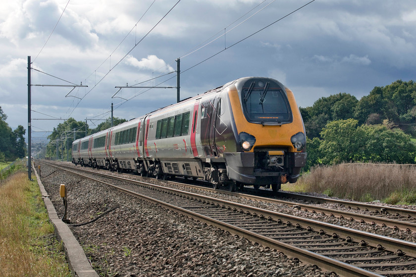 221123, XC 13.00 Bristol Temple Meads-Manchester Piccadilly (1M45, 16L), Vigo SO986712 
 Against a dramatic looking sky 221123 climbs Lickey Incline working the 13.00 Bristol Temple Meads to Manchester Piccadilly. The planners and engineers who designed and installed the electrification masts were obviously briefed by photographers at this spot as they put no mast in front of the foot crossing to spoil this view - thank you! This four-car DMU made fairly light work of the climb from Bromsgrove to Barnt Green passing Andy and me here at about fifty miles per hour. The sky in this image was to deposit a good slug of rain on us presently, at least we had left Vigo and were in the car by the time it started! 
 Keywords: 221123 13.00 Bristol Temple Meads-Manchester Piccadilly 1M45 Vigo SO986712