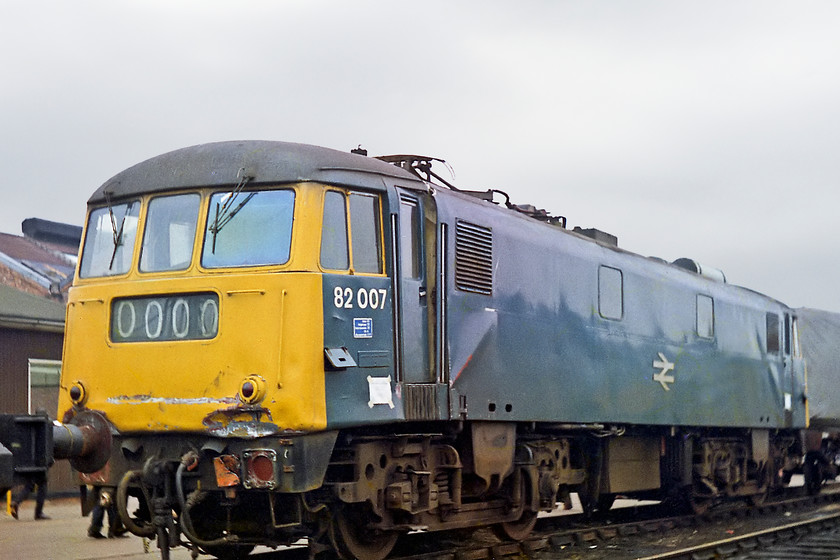 82007, awaiting repair, Crewe Works 
 82007 has sustained severe accident damage that has bent the underframe and superstructure. However, the better news was that it was repaired here at Crewe Works and continued in service until 1983. It went to Vic Berry's at Leicester to be disposed of.