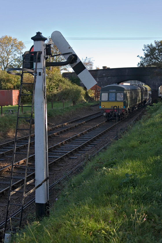 M51192 & M56352, 09.45 Sheringham-Holt, Weybourne station 
 One of the resident North Norfolk Railway DMU pairings of M51192 and M56352 leave Weybourne station working the first passenger service of the day. The Class 101 DMU is working the 09.45 Sheringham to Holt that will soon be stopping at Kelling Heath station where I suspect that there will be few if any passengers for this early day service. 
 Keywords: M51192 M56352 09.45 Sheringham-Holt Weybourne station first generation DMU Class 101