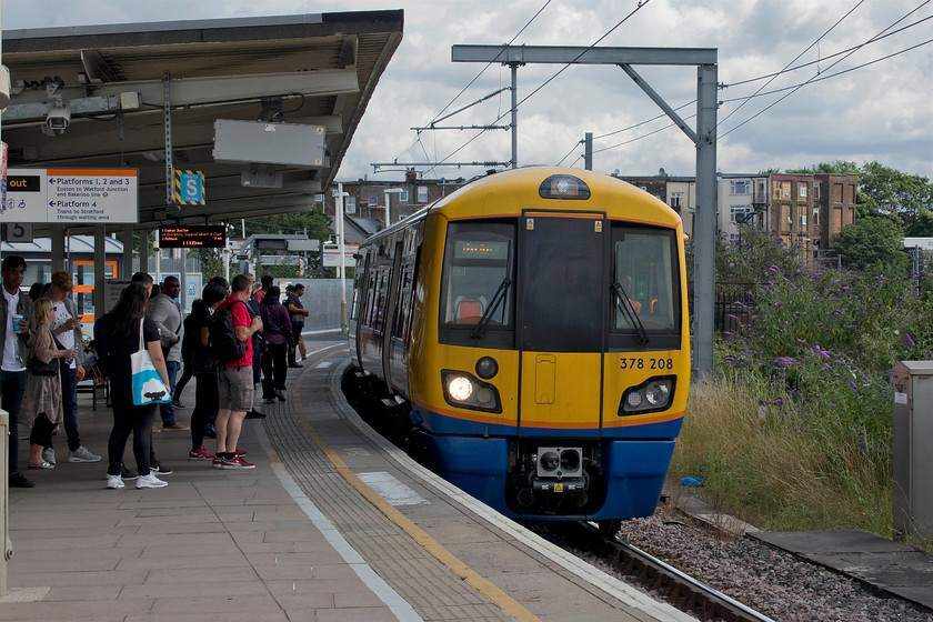 378208, LO 10.23 Stratford-Clapham Junction (2Y42, RT), Willesden Junction station 
 378208 arrives at Willesden Junction station forming the 10.23 Stratford to Clapham Junction service. We took this train the short distance to Shepherd's Bush station where my wife and son enjoyed some full-on retail therapy at the Westfield shopping centre; I found a trip to King's Cross a far more rewarding, and cheaper, experience! 
 Keywords: 378208 10.23 Stratford-Clapham Junction 2Y42 Willesden Junction station