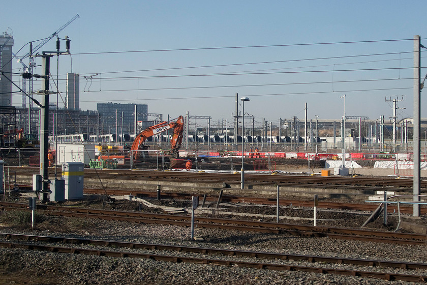 Stored Crossrail class 345s, Old Oak Common 
 What a farce! Lines of brand new class 345 Crossrail units sit in their brand new depot at Old Oak Common with nowhere to go. When the inevitable time and 2billion over-run of the Crossrail project was announced nearly all the units were delivered from the builder. So, they have to sit patiently waiting the call whilst still being paid for and leased at huge expense to the taxpayer. 
 Keywords: Stored Crossrail class 345s Old Oak Common