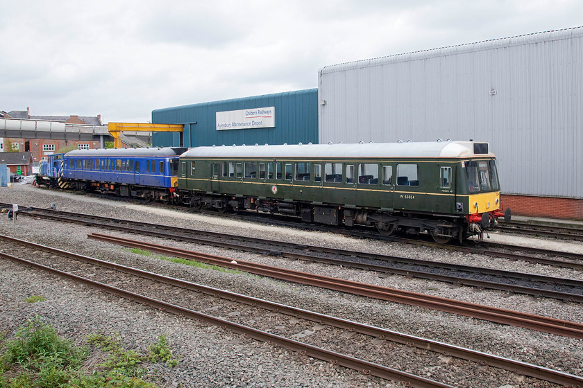 121034, 121020 & ex. 01509, stabled, Aylesbury Depot 
 121034 and 121020 sit stabled at Chiltern's Aylesbury Depot with resident shunter ex. 01509. The two "Bubble Car" units class 121s were originally numbered as 55XXX . They were built by Pressed Steel at Linwood in Scotland for the Western region of British Railways. It was thought that their use would help to save the branches that they were designed for and, to an extent, they did. The shunter was built in 1963 and named 'Lesley' and is used for shunting units around the Aylesbury depot. 
 Keywords: 121034 121020 01509 stabled Aylesbury Depot