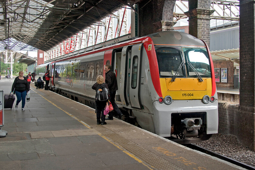 175004, AW 15.44 Llandudno-Manchester Airport (1H91, 1L), Chetser station 
 Up for imminent replacement.

With more railway staff in view than passengers 175004 pauses at Chester station working the 15.44 Llandudno to Manchester Airport service. Quite where these units will end up when they are replaced in the next twelve months I am not at all sure. After their recent full overhaul, they are too good to be disposed of surely? 
 Keywords: 175004 15.44 Llandudno-Manchester Airport 1H91 Chester station TfW Transport for Wales.