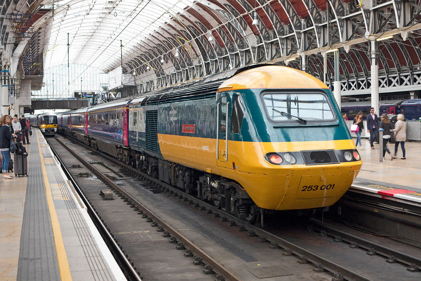 43002 (253001), GW 16.00 London Paddington-Bristol Temple Meads (1C21), London Paddington station 
 It's a shame that GWR and Angel Trains (the owners of the HSTs) did not re-paint a complete set of stock into the as-built livery like the power car 43002 'Sir Kenneth Grange'. They cited issues regarding access for partially sighted passengers due to a lack of differentiation of door colour. Here at Paddington station, 43002 recreating set 253001 waits to leave with the 16.00 to Bristol Temple Meads. 
 Keywords: 43002 253001 16.00 London Paddington-Bristol Temple Meads 1C21 London Paddington station