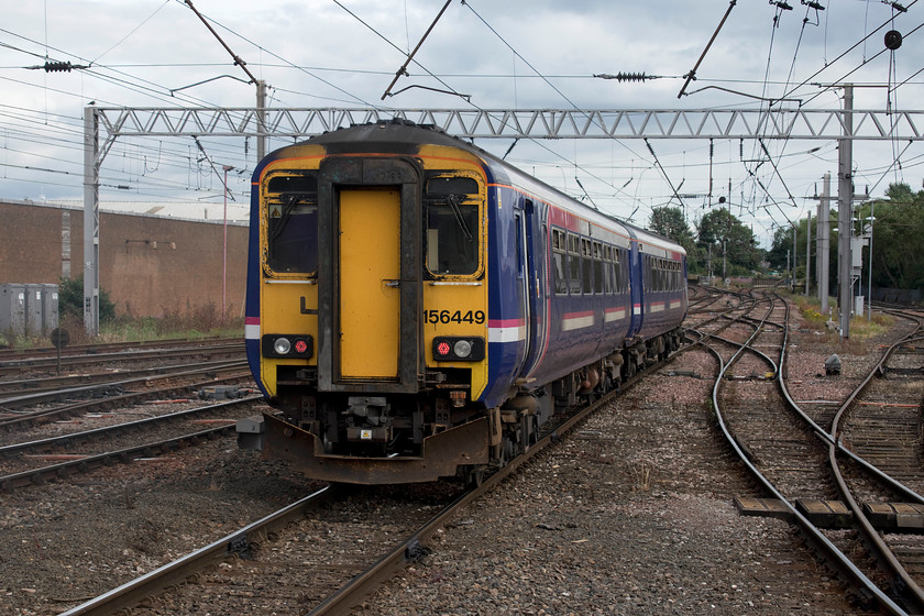 27. 156449, NT 17.07 Carlisle-Barrow-in-Furness (2C38, 1E), Carlisle station 
 156449 leaves one of Carlisle's south-facing bay platforms with the 17.07 to Barrow-in-Furness. This unit will take the superb Cumbrian Coast route, one of the most underrated lines in the country. When people are asked to consider classic railway routes the Settle and Carlisle, the south Devon coast and Scottish Highland routes come to mind but the line via Workington to Barrow and onwards to Lancaster is often overlooked. Securing a west-facing window seat with a snack and a flask along with some agreeable company is something that should be tried! 
 Keywords: 156449 17.07 Carlisle-Barrow-in-Furness 2C38 Carlisle station