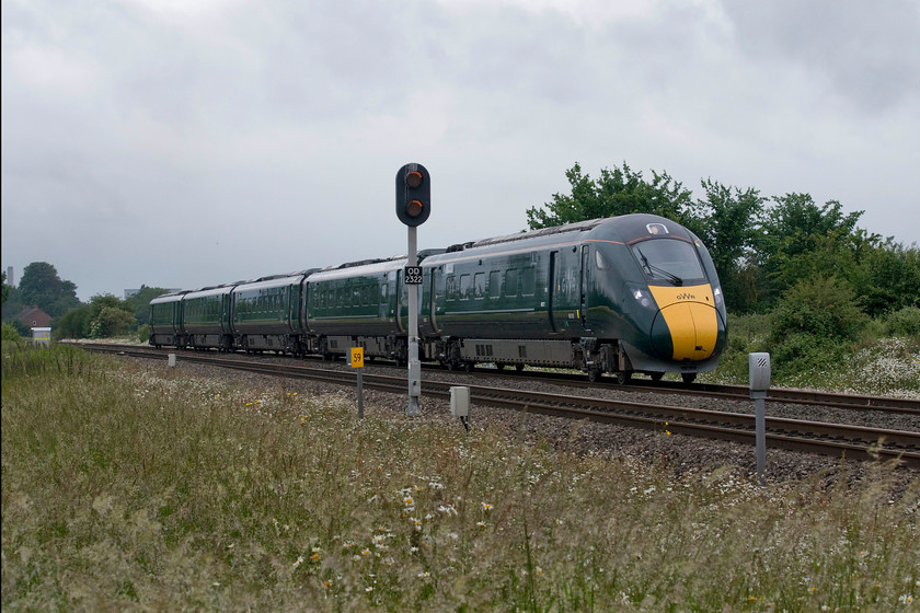 802022, GW 11.52 London Paddington-Oxford (1D31, 15L), Radley SP527002 
 Approaching journey's end, the 1D31 11.52 Paddington to Oxford passes Radley under grey skies that were just starting to produce yet more rain! The train is formed by one of the five-car class 802 IETs number 802022. Not so long ago this would have been an HST or even a Turbo unit, and, before that a set of coaching stock hauled by a class 47 or even a 50! You decide on what you would prefer, needless to say, for me it would not be the IET because of its awfull seating. 
 Keywords: 802022 11.52 London Paddington-Oxford 1D31 Radley SP527002