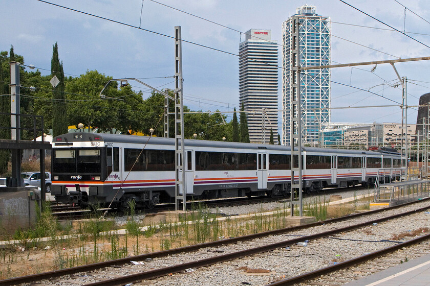 470 093, stabled, Barcelona Frana station 
 With the cloud building at the end of what had been a very hot day heralding a very stormy night to come, 470 093 is seen stabled just outside Barcelona Frana station. The fifty-odd Renfe Class 470s are found throughout the Spanish network and are a development of the older Class 440 and have a maximum operating speed of nearly 90 mph. 
 Keywords: 470 093 stabled Barcelona Frana station