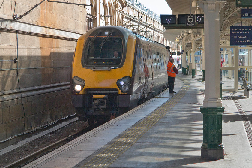 221129, XC 07.35 Newcastle-Glasgow Central (1S29), Edinburgh Waverley station 
 The dispatcher raises his paddle in the air to the train manger (a guard to you and I) indicating it's time to leave Edinburgh Waverley station. CrossCountry's 221119 was a former Virgin unit named 'Amelia Earhart' and is seen here working the 07.35 Newcastle to Glasgow Central. 
 Keywords: 22112907.35 Newcastle-Glasgow Central 1S29 Edinburgh Waverley station