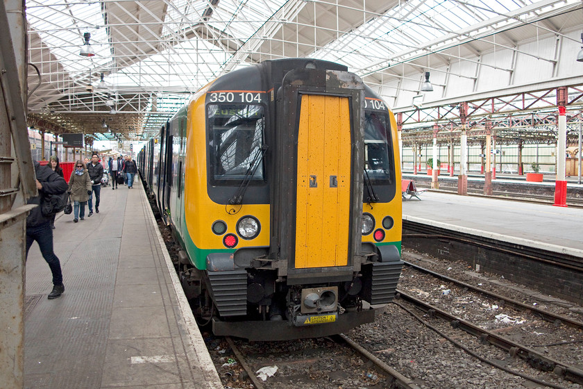 350104, LM 09.46 London Euston-Crewe (1U29), Crewe station 
 With my wife and son, I travelled from Stoke-on-Trent to Crewe on London Midland's 350104. It is seen at the Cheshire town having terminated with the 1U29 09.46 from Euston. 
 Keywords: 350104 09.46 London Euston-Crewe 1U29 Crewe station