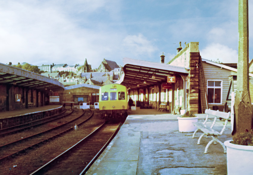 Class 101 DMU, unidentified Whitby-Middlesborough, Whitby station 
 In 1978 Whitby station remained fairly large with most of it un-used. It many original features such as enamel signs and retained its mechanical signalling. Here, a class 101 DMU waits to leave with a Middlesborough train. Until 1953 the station boasted an overall roof but British Railways sought to remove it and replaced it with the awnings shown here. After continual rationalisation the station was reduced to just one platform, the one on the left in this image. That was until 2014 when the platform the DMU is at (two) was reopened for use by the North Yorkshire Railway to operate their extended steam services from Grosmont. 
 Keywords: Class 101 DMU Whitby-Middlesborough Whitby station