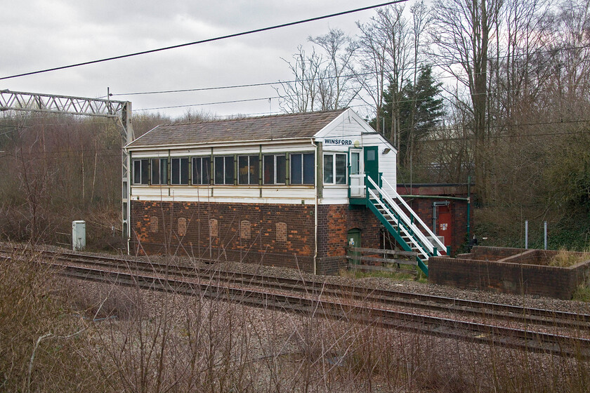 Winsford signal box (LNW, 1897) 
 I have seen photographed Winsford signal box back in 2019 in much better weather than today, see.... https://www.ontheupfast.com/p/21936chg/26089868804/winsford-signal-box Its remarkable survival as an operating box controlling traffic between Coppenhall and Weaver Junction is surely very limited now given that it's in its one hundred and twenty-seventh year of operation, it is even more unusual in that it has a lever frame (although it only has six working levers) running alongside an NX panel. Andy was anxious to get an image of the box so I thought that I would do the same again! 
 Keywords: Winsford signal box LNW