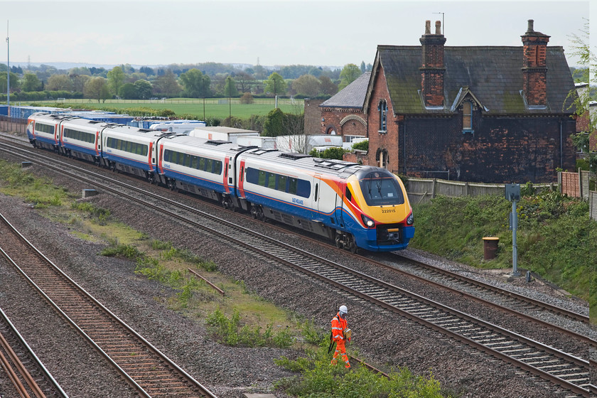 222015, EM 09.29 London St. Pancras-Nottingham (1D19, RT), Oakley TL013539 
 222015 '175 Years of Derby's Railways 1839 - 2014' heads north past Oakley in Bedfordshire working the 09.29 London St. Pancras to Nottingham. Note the piling in the ground just in front of the colour light signal. This will be where one of the electrification masts will sit that will support the associated paraphernalia that will ruin yet another shot of the railway! 
 Keywords: 222015 1D19 Oakley TL013539